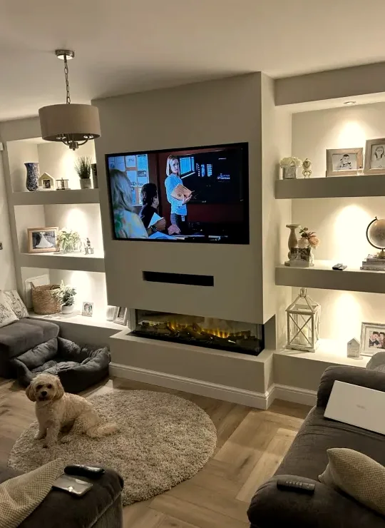Television in a modern UK living room with a compact streaming device